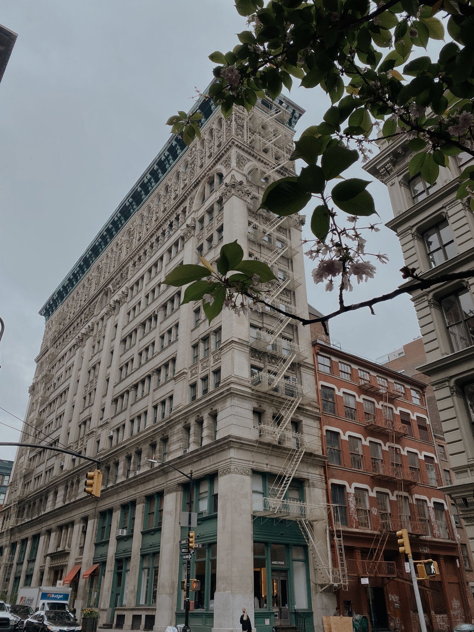 Ornate cast-iron building facade detail on a historic NYC building